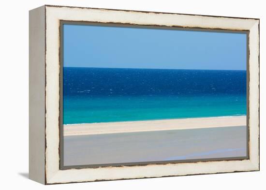 Sandy beach and bright blue ocean, Fuerteventura-Edwin Giesbers-Framed Premier Image Canvas