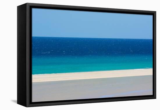 Sandy beach and bright blue ocean, Fuerteventura-Edwin Giesbers-Framed Premier Image Canvas