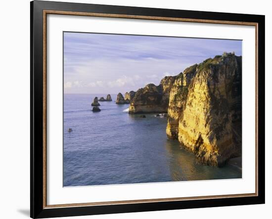 Sanstone Cliffs at Praia de Dona Ana Beach in Portugal-Merrill Images-Framed Photographic Print