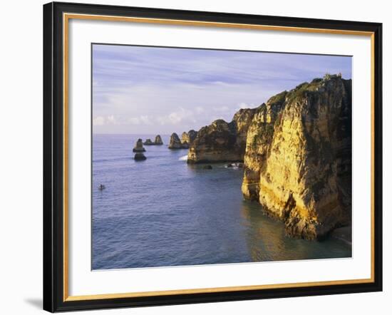 Sanstone Cliffs at Praia de Dona Ana Beach in Portugal-Merrill Images-Framed Photographic Print