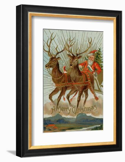 Santa and His Reindeer Flying Through the Sky with a Sleigh Full of Christmas Goodies-null-Framed Photographic Print