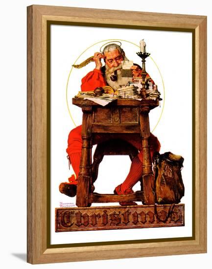 "Santa at His Desk", December 21,1935-Norman Rockwell-Framed Premier Image Canvas