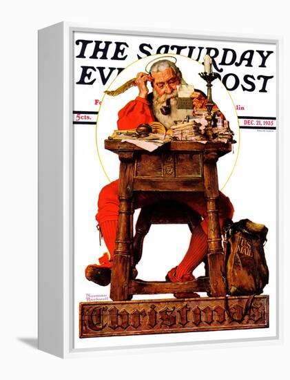 "Santa at His Desk" Saturday Evening Post Cover, December 21,1935-Norman Rockwell-Framed Premier Image Canvas