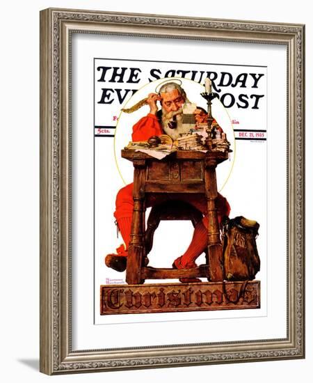 "Santa at His Desk" Saturday Evening Post Cover, December 21,1935-Norman Rockwell-Framed Giclee Print