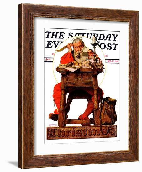 "Santa at His Desk" Saturday Evening Post Cover, December 21,1935-Norman Rockwell-Framed Giclee Print