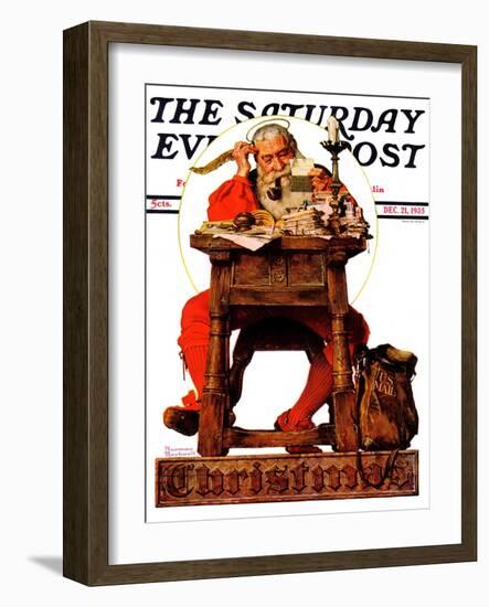 "Santa at His Desk" Saturday Evening Post Cover, December 21,1935-Norman Rockwell-Framed Premium Giclee Print