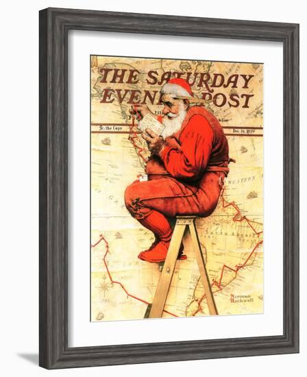 "Santa at the Map" Saturday Evening Post Cover, December 16,1939-Norman Rockwell-Framed Giclee Print