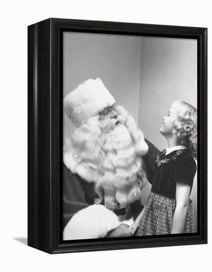 Santa Claus and 5 Year Old Demonstrating Right Way to Hold Child-Martha Holmes-Framed Premier Image Canvas