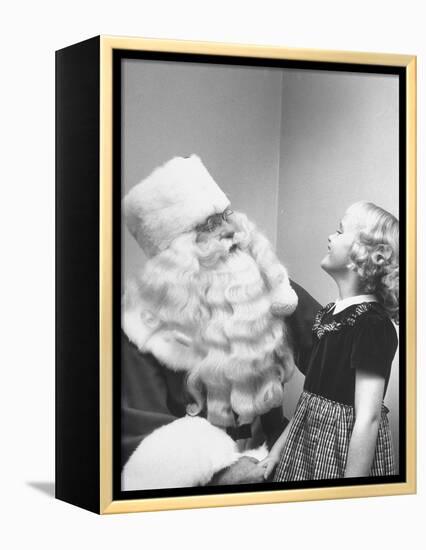 Santa Claus and 5 Year Old Demonstrating Right Way to Hold Child-Martha Holmes-Framed Premier Image Canvas