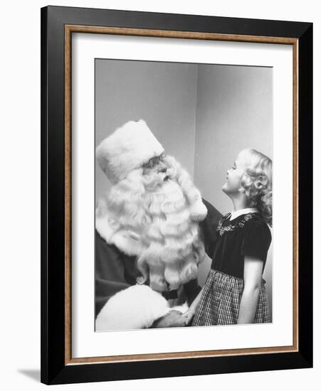 Santa Claus and 5 Year Old Demonstrating Right Way to Hold Child-Martha Holmes-Framed Photographic Print