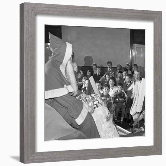 Santa Claus at a Methodist Church in Swinton, South Yorkshire, 1964-Michael Walters-Framed Photographic Print