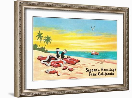 Santa Claus in Inner Tube at Beach-null-Framed Art Print