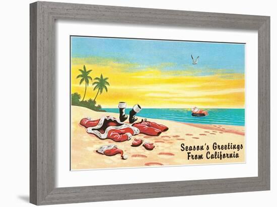 Santa Claus in Inner Tube at Beach-null-Framed Art Print