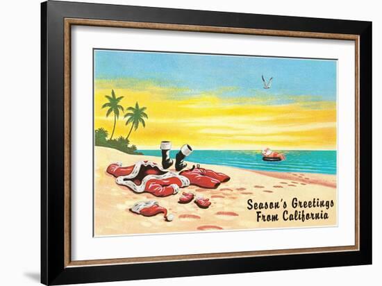 Santa Claus in Inner Tube at Beach-null-Framed Art Print