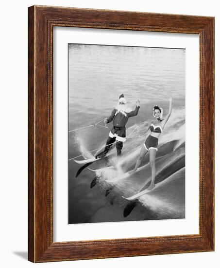 Santa Claus Water Skiing with Female Friend-null-Framed Photographic Print