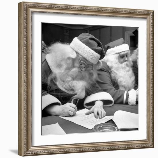 Santa Clauses Take a Written Examination For Diploma After Listening to Lectures-Martha Holmes-Framed Photographic Print