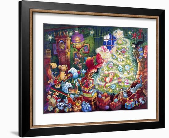 Santa Decorates Tree Surrounded by Presents and Catschristmas-Bill Bell-Framed Giclee Print