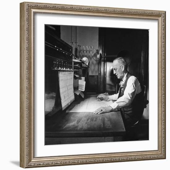 Santa Fe Railroad Dispatcher Working on a Freight Train-Bernard Hoffman-Framed Photographic Print