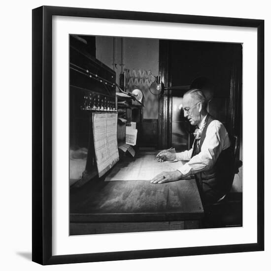 Santa Fe Railroad Dispatcher Working on a Freight Train-Bernard Hoffman-Framed Photographic Print