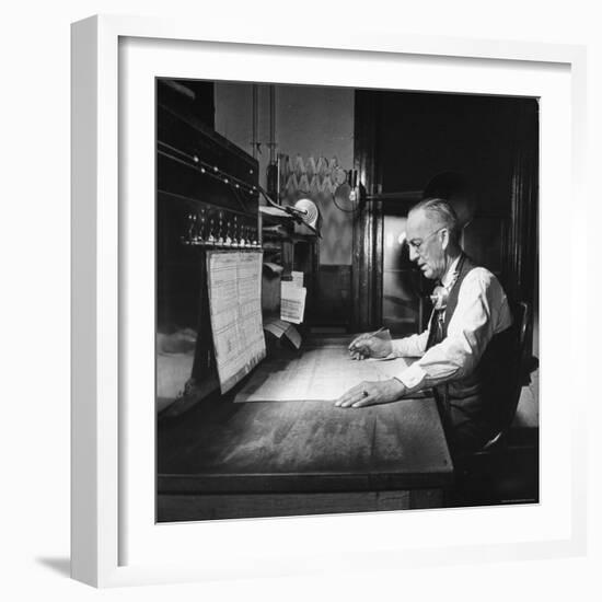 Santa Fe Railroad Dispatcher Working on a Freight Train-Bernard Hoffman-Framed Photographic Print