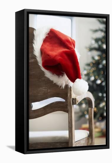 Santa Hat on Chair-Pauline St^ Denis-Framed Premier Image Canvas