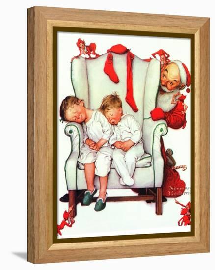 Santa Looking at Two Sleeping Children (or Santa Filling the Stockings)-Norman Rockwell-Framed Premier Image Canvas