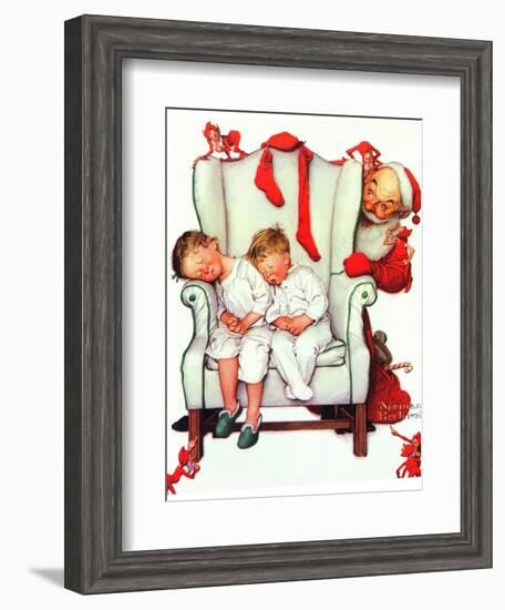 Santa Looking at Two Sleeping Children (or Santa Filling the Stockings)-Norman Rockwell-Framed Giclee Print