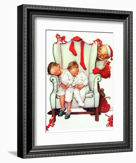 Santa Looking at Two Sleeping Children (or Santa Filling the Stockings)-Norman Rockwell-Framed Giclee Print