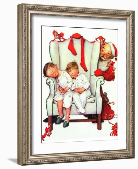 Santa Looking at Two Sleeping Children (or Santa Filling the Stockings)-Norman Rockwell-Framed Giclee Print