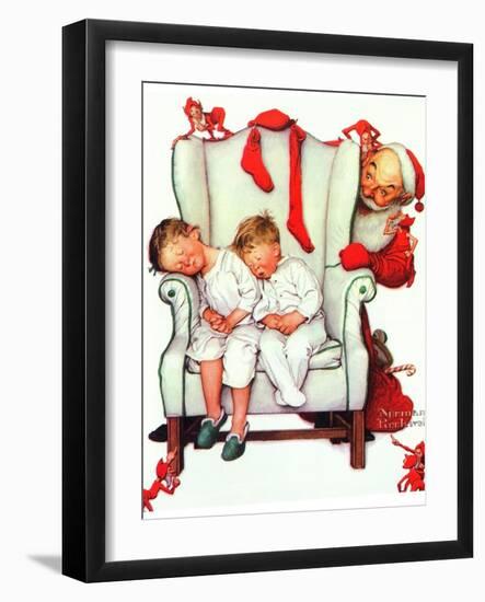 Santa Looking at Two Sleeping Children (or Santa Filling the Stockings)-Norman Rockwell-Framed Giclee Print