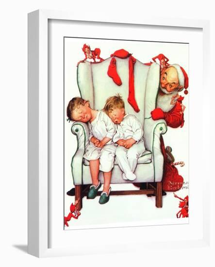 Santa Looking at Two Sleeping Children (or Santa Filling the Stockings)-Norman Rockwell-Framed Giclee Print