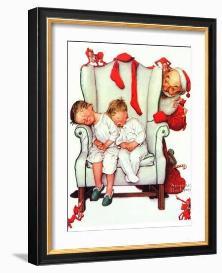 Santa Looking at Two Sleeping Children (or Santa Filling the Stockings)-Norman Rockwell-Framed Giclee Print