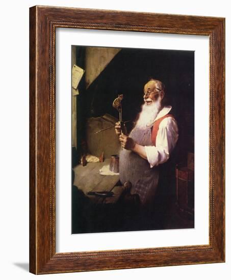 Santa’s Workshop (or Santa working in his shop)-Norman Rockwell-Framed Giclee Print