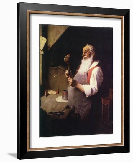 Santa’s Workshop (or Santa working in his shop)-Norman Rockwell-Framed Giclee Print