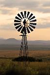 An Old Windmill on a Farm in a Rural or Rustic Setting at Sunset.-SAPhotog-Laminated Photographic Print