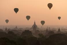 Bagan, balloons flying over ancient temples-Sarawut Intarob-Photographic Print