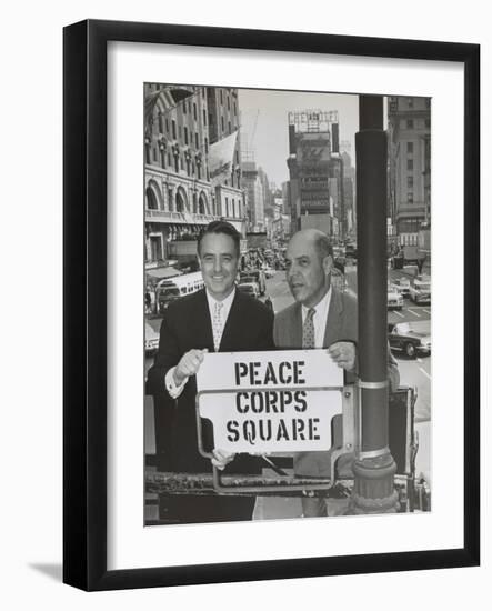 Sargent Shriver and Edward R. Dudley in Times Square with a Sign 'Peace Corps Square'-null-Framed Photo