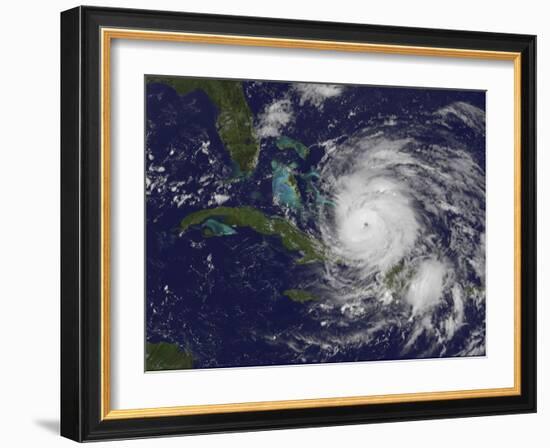 Satellite View of the Eye of Hurricane Irene as it Enters the Bahamas-Stocktrek Images-Framed Photographic Print