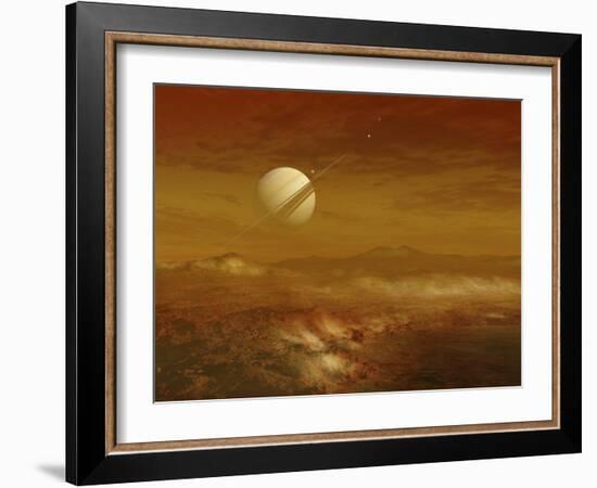 Saturn Above the Thick Atmosphere of its Moon Titan-Stocktrek Images-Framed Photographic Print