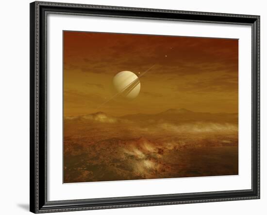 Saturn Above the Thick Atmosphere of its Moon Titan-Stocktrek Images-Framed Photographic Print