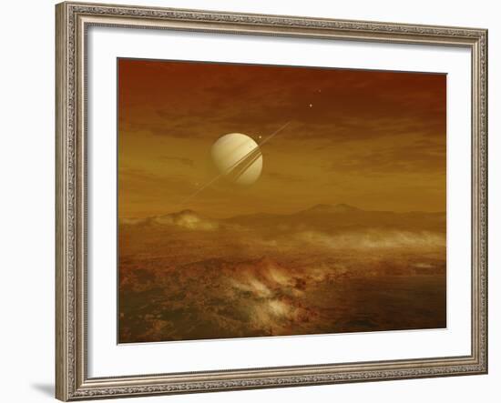 Saturn Above the Thick Atmosphere of its Moon Titan-Stocktrek Images-Framed Photographic Print