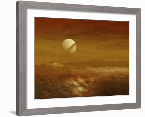 Saturn Above the Thick Atmosphere of its Moon Titan-Stocktrek Images-Framed Photographic Print