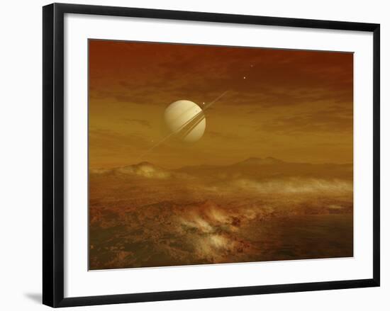 Saturn Above the Thick Atmosphere of its Moon Titan-Stocktrek Images-Framed Photographic Print