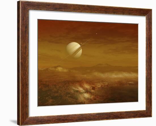 Saturn Above the Thick Atmosphere of its Moon Titan-Stocktrek Images-Framed Photographic Print