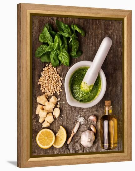 Sauce Pesto and its Ingredients on Rough Wood-Andrii Gorulko-Framed Premier Image Canvas