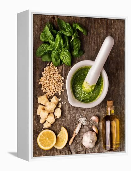 Sauce Pesto and its Ingredients on Rough Wood-Andrii Gorulko-Framed Premier Image Canvas