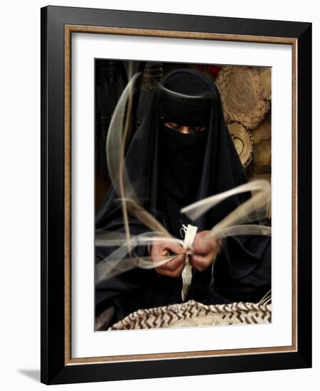 Saudi Woman Works to Demonstrate Her Craft as She Makes a Cane Box at a Fair in Riyadh-null-Framed Photographic Print