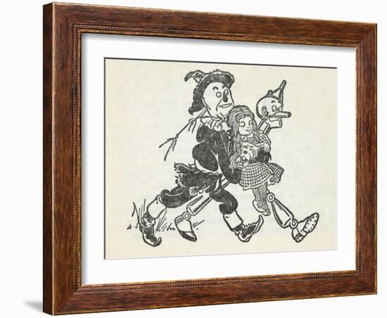 Scarecrow and the Tin Woodman Carrying a Sleeping Dorothy and Toto Out Of the Deadly Poppy Field-William Denslow-Framed Giclee Print