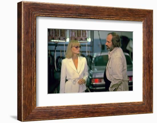 SCARFACE, 1983 directed by BRIAN by PALMA On the set, Michelle Pfeiffer with the director, Brian by-null-Framed Photo