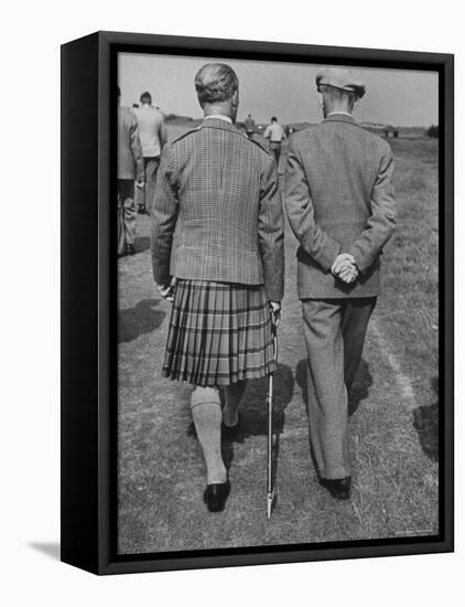 Scene from a Golf Tournament, with a Man Carrying a Shooting Stick-Carl Mydans-Framed Premier Image Canvas